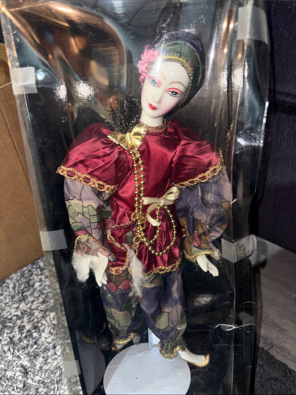 Decorative Porcelain jester Doll and in Burgundy and Multicolor